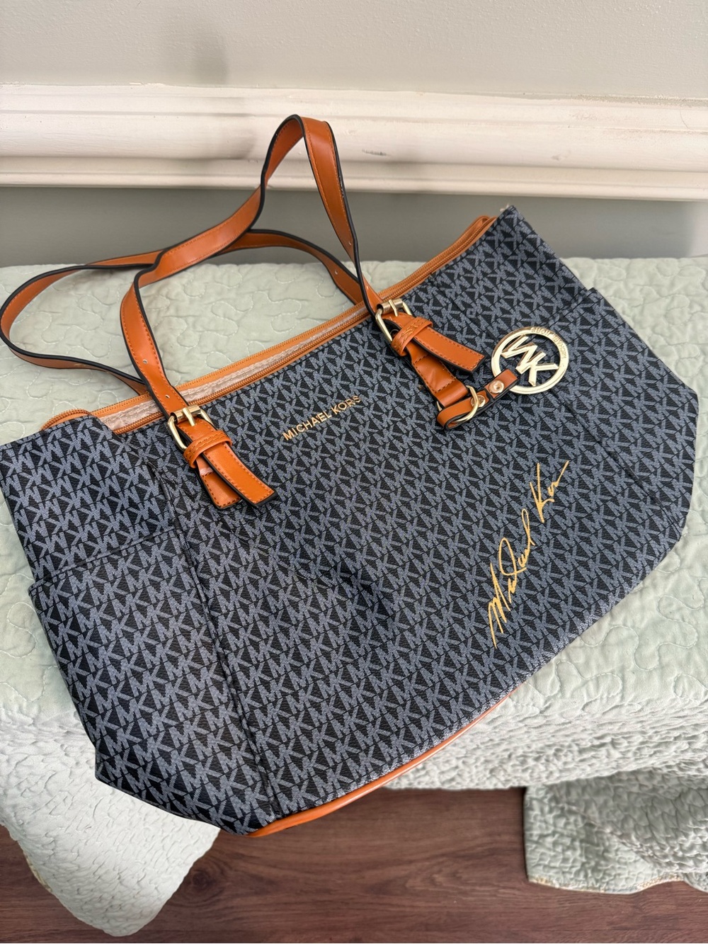 Michael Kors Black and Brown Signature MK Tote with Gold Hardware